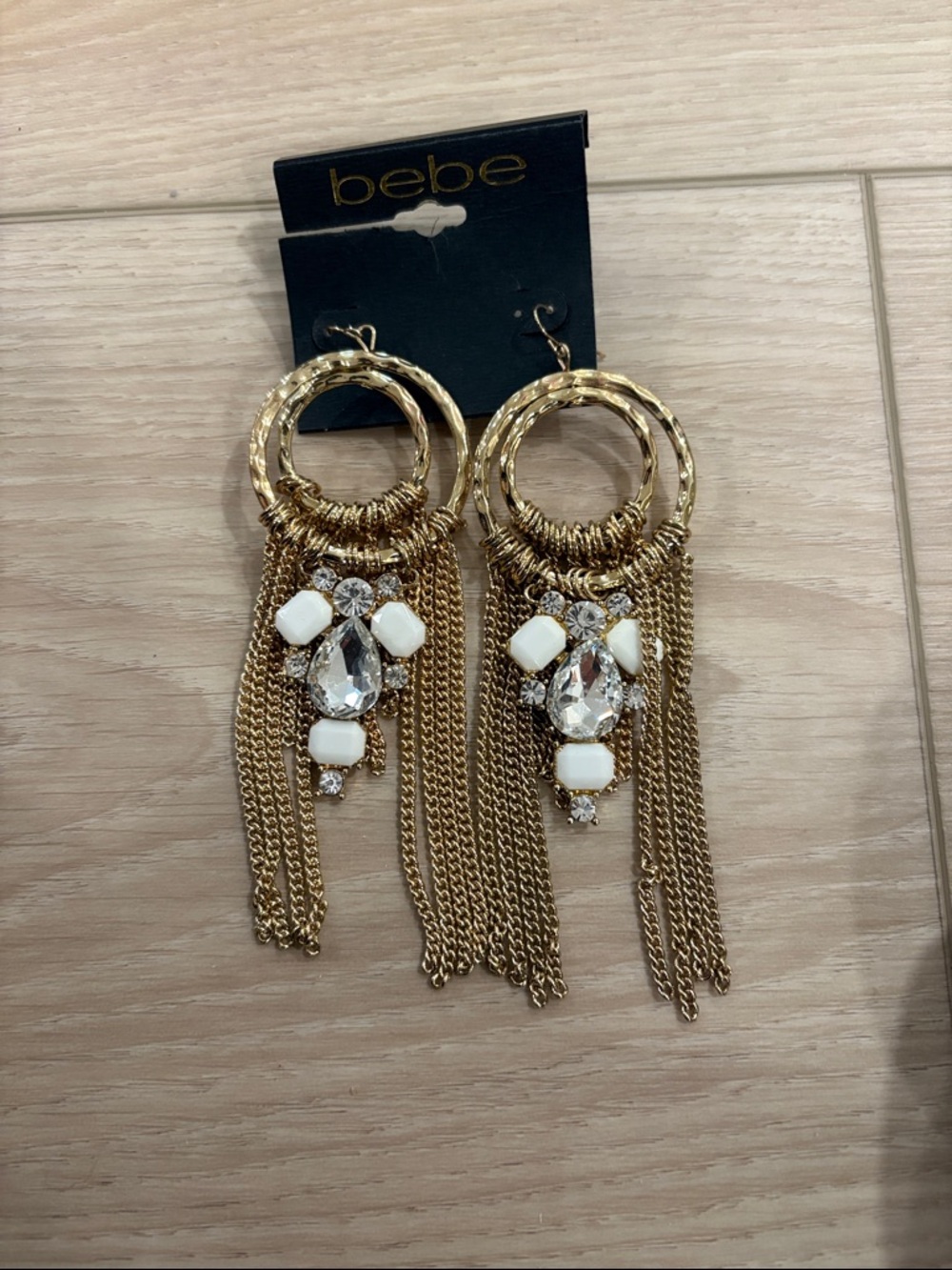 Bebe jeweled gold hanging earrings
